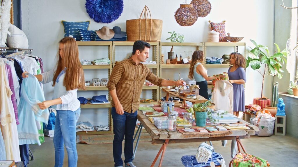 Retail store manager using FlexRetail unified POS platform to manage real-time inventory, e-commerce orders, and store operations from a single dashboard