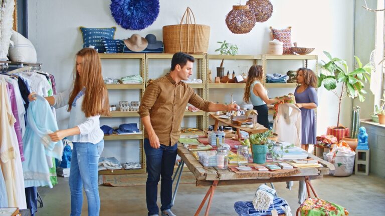 Retail store manager using FlexRetail unified POS platform to manage real-time inventory, e-commerce orders, and store operations from a single dashboard