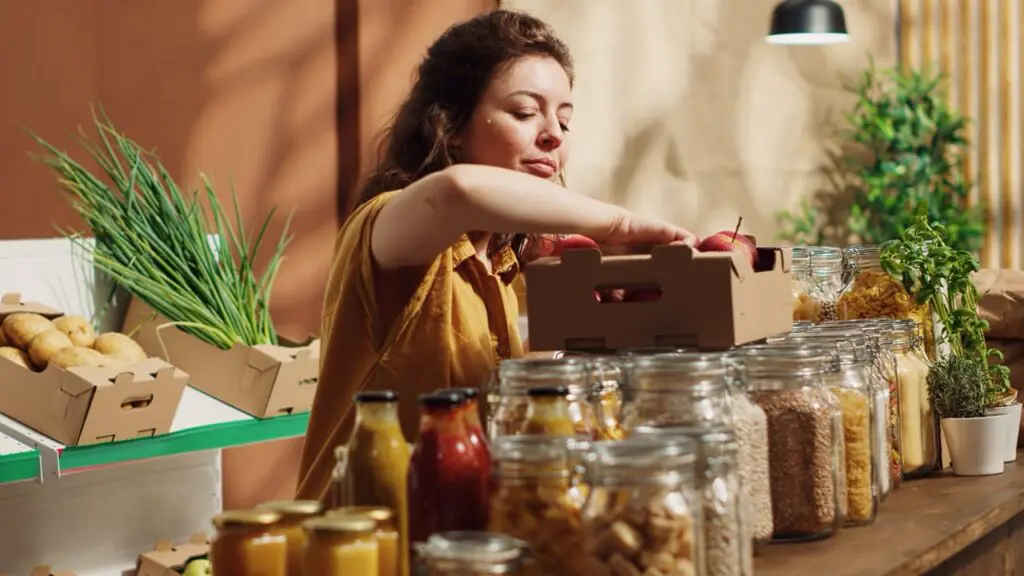 specialty grocer reviewing POS sales velocity data to identify niche product trends