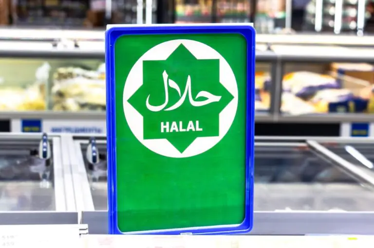 Halal market checkout counter displaying certified product labels and POS terminal